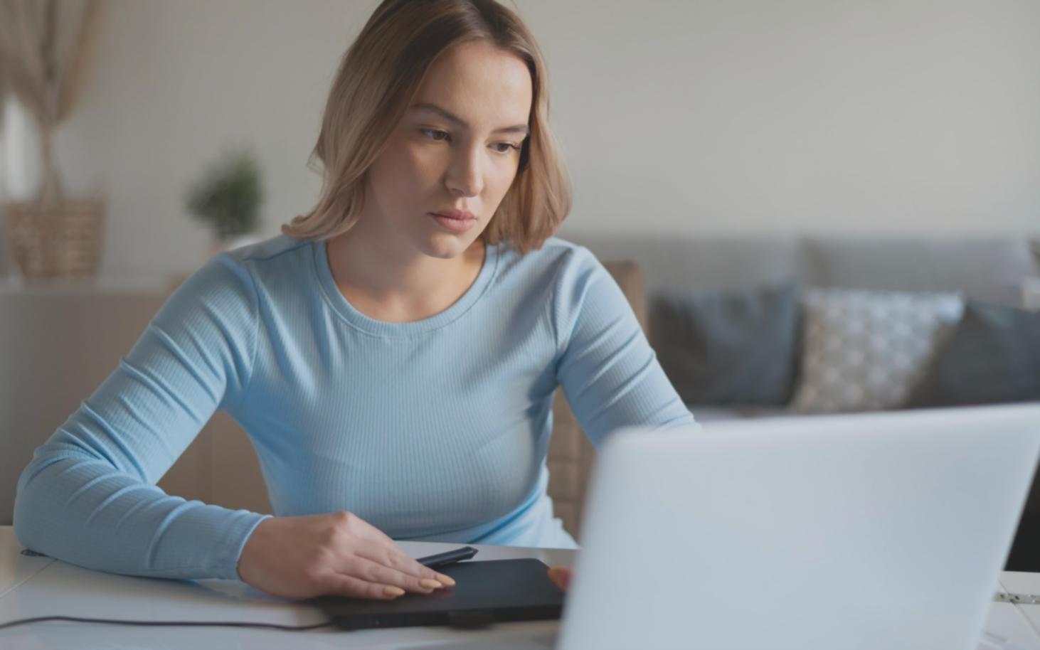 Professional workspace showing budget planning documents and software interface